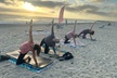 Join a Drop-In for One Beach Yoga Class for One or Two People at Floating Yogis (Up to 20% Off) - Second Medium