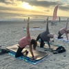Image 2: Join a Drop-In for One Beach Yoga Class for One or Two People