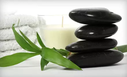 Two Infrared Sauna Sessions or Permanent Eyelash Extensions at Essence Massage and Spa - Primary Image