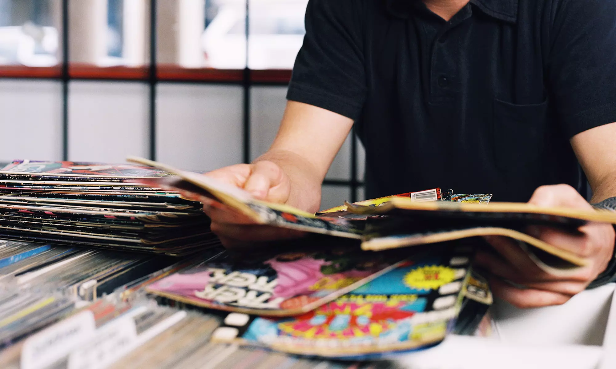 Comics, DVDs, and Memorabilia at Tramps Comics and Card Games (40% Off). Two Options Available. - Primary Image