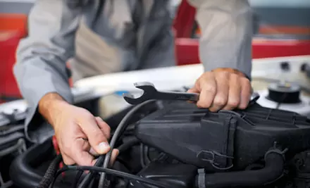 Oil Change and Tire Rotation Package at Larry Johnson's Buckhead Auto Center (Up to 77% Off) - Primary Image