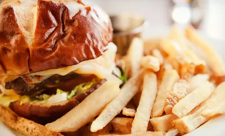 Two-Course Dinner for Two or Four or $10 for $20 Worth of Burgers and Sandwiches for Lunch at Wheelhouse Pub - Primary Image