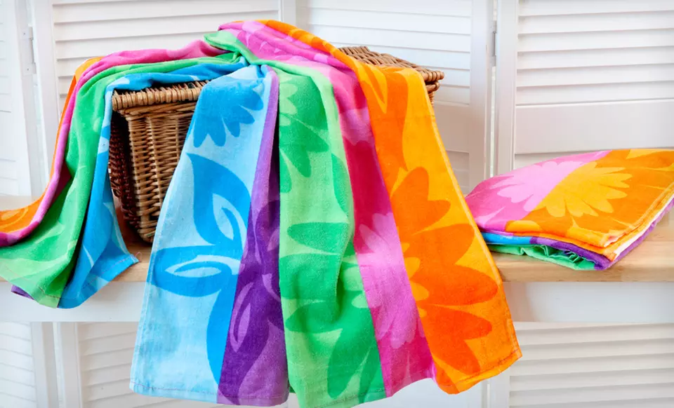 $13.99 for a Tropicale Velour Beach Towel 2-Pack ($59.98 List Price). Multiple Styles. Free Returns. - Second Medium