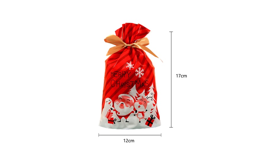 Image 8: 50-Piece Christmas Drawstring Gift Bag Set