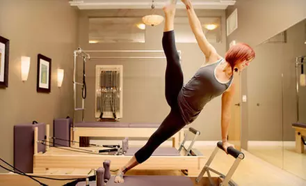 5 or 10 TRX Suspension or Pilates Reformer Classes at Reforming Indy (Up to 68% Off) - Primary Image