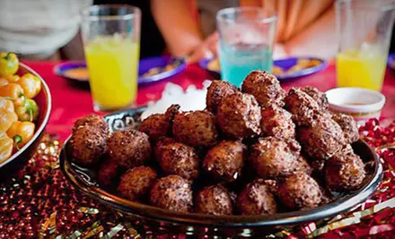 $10 for Great Balls of Fire Cheese Fritters and Margaritas for Two at Salvador Molly's (Up to $20.45 Value) - Primary Image
