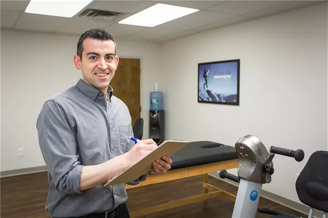 Exam with One Adjustment, Trigger-Point Therapy, and Exercises at Everest Chiropractic (Up to 86% Off)