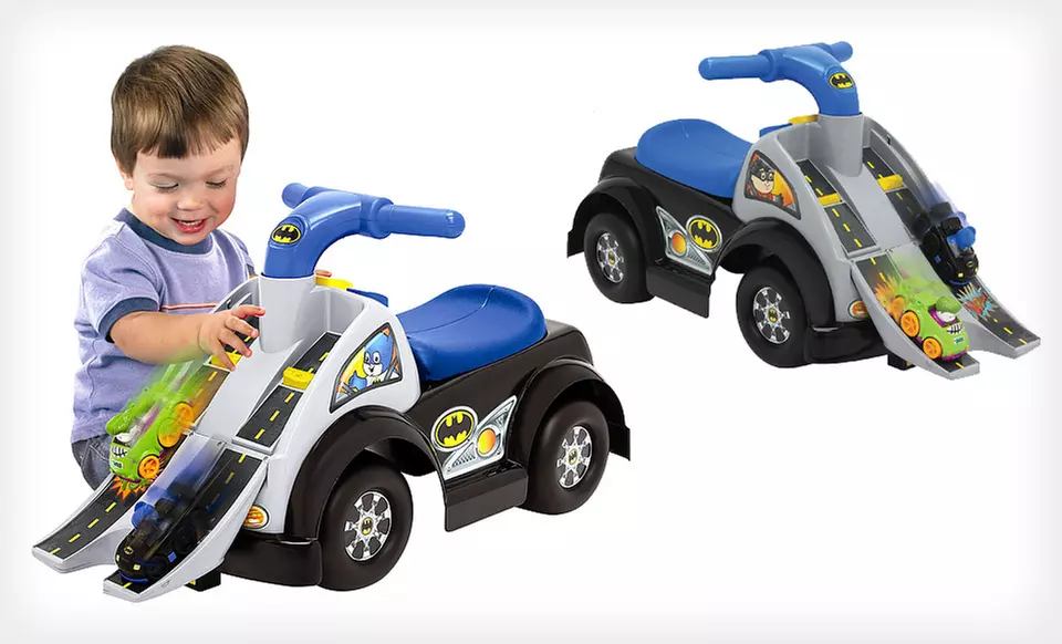 $40 for a Fisher-Price Music Parade, Shop 'N Roll, or Batman Ride-On Toy ($56.44 List Price). Shipping Included. - Second Medium