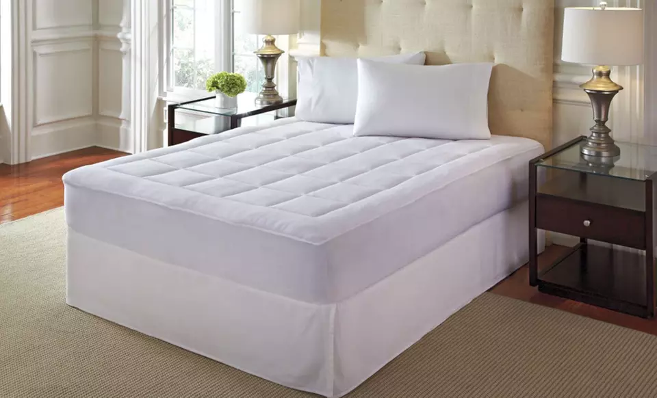 Dream Cloud Microplush Overfilled Mattress Pad. Multiple Sizes Available from $29.99–$39.99.  - Primary Image