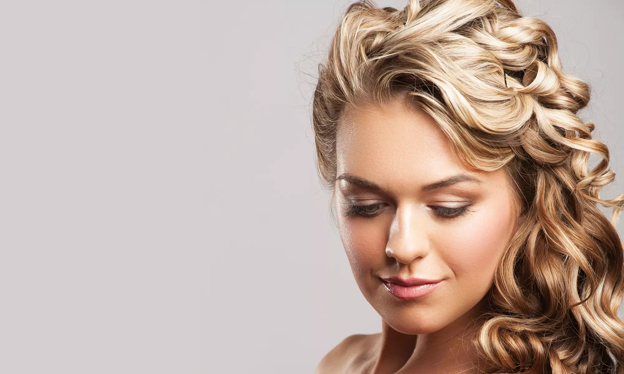 Haircut with Options for Partial or Full Highlights at Ooh La La Salon and Spa (Up to 51% Off) - Primary Image