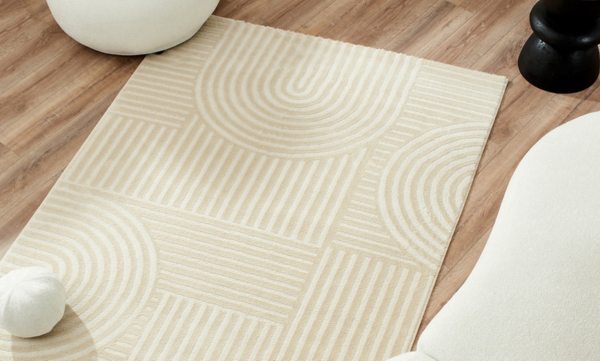 Image 20: Tapis à relief clair avec un design Art Déco