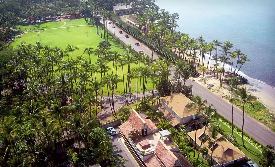 5-Night Stay with a Bottle of Champagne, Rose Petals on Bed, and Tropical Flowers in Room at Maui Sunseeker in Maui, HI - Primary Image