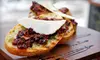 Après-Ski Small Plates for Two or Four with Tapas, Dessert, and Hot Beverages at Globe Cafe & Tapas Bar (Up to 54% Off)
