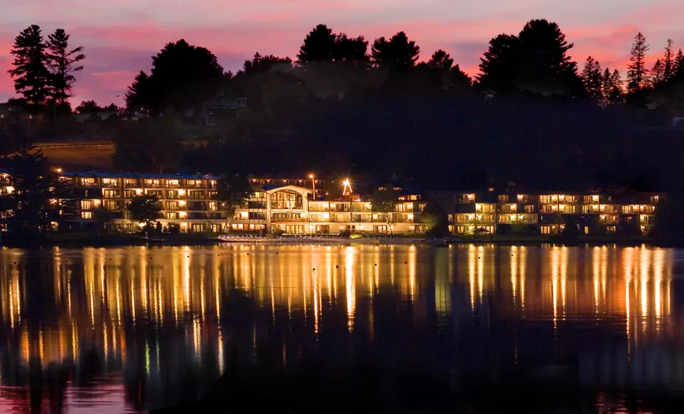 Stay with Bottle of Wine or Drink Coupons at Golden Arrow Resort in Lake Placid, NY. Dates into June. - Primary Image