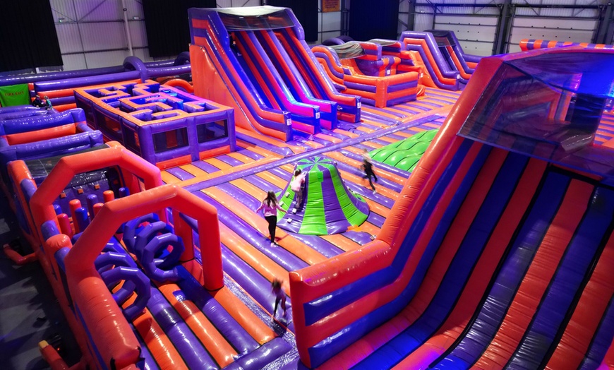 Image 2: Bounce into Fun: Inflatable Park Entry for Up to  Four People!