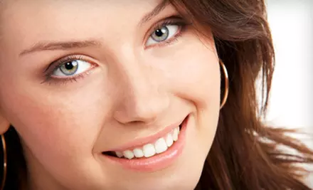 $45 for Dental Exam, X-rays, and Teeth Cleaning from Heartland Dental Care ($341 Value). Two Locations Available. - Primary Image