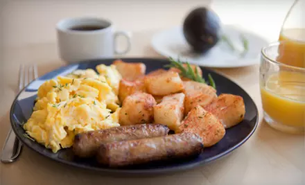 Two Café Dinner Entrees and One Dessert or $12 for $20 Worth of Breakfast or Lunch at Sky Blue Cafe  - Primary Image