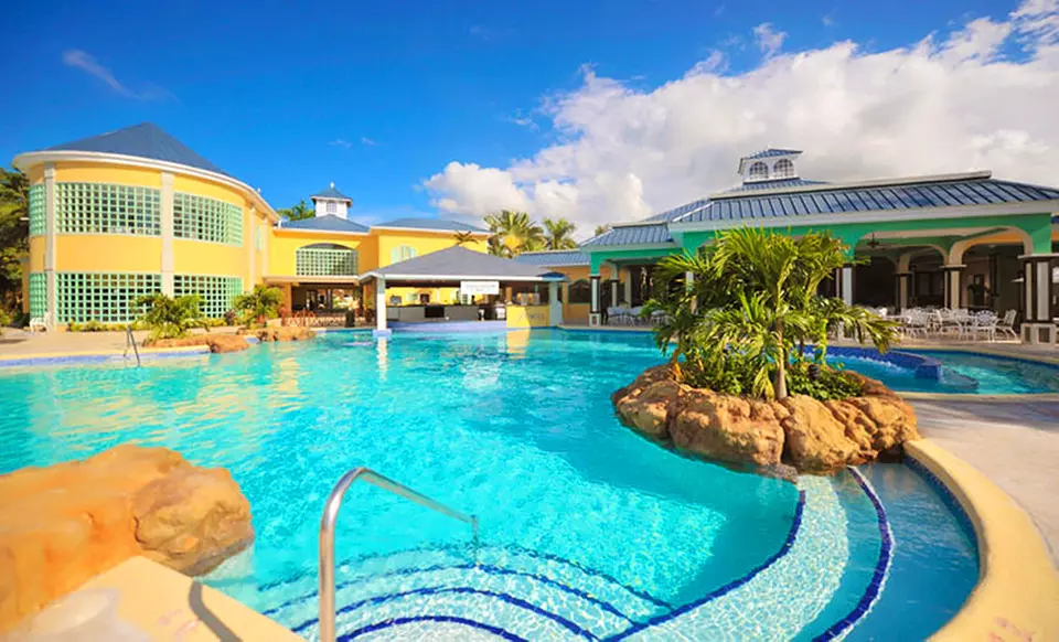 4- or 6-Night All-Inclusive Stay with Airfare. Includes Taxes and Fees. Price Per Person Based on Double Occupancy. - Primary Image