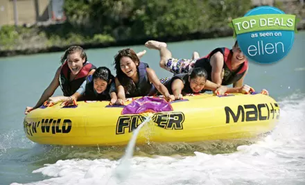$69 for a Bumper-Tube Ride and Standup Paddleboard Lesson from South Pacific Watersports ($149 Value) - Primary Image