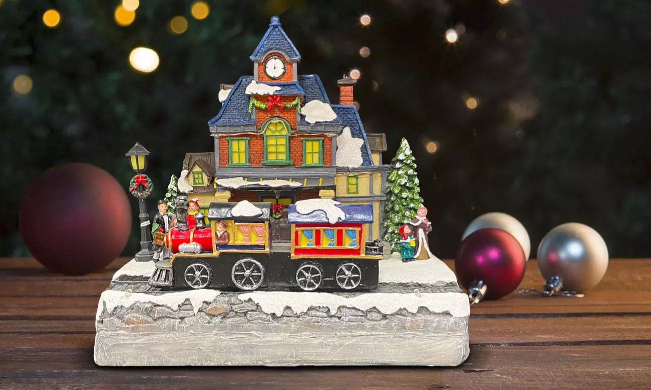 Adorno navideño "Aldea de Navidad" con luces de colores y melodía