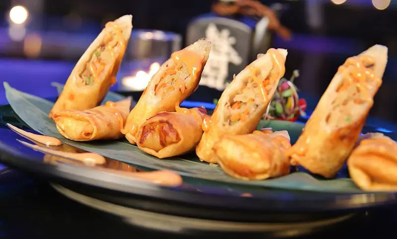 Enjoy up to 37% off at Sushi Mambo with $40 value for two or $60 value for four, blending sushi and Latin flavors