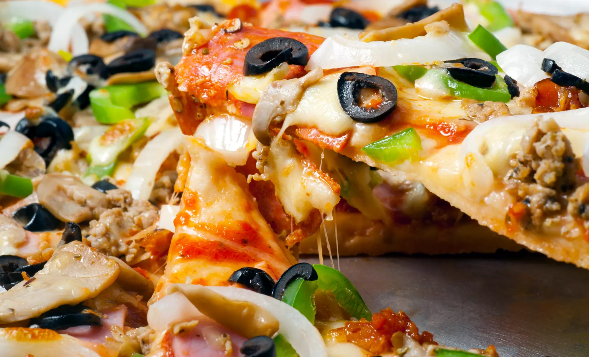 Large Pizza with Lasagna, Garlic Toast, and Pop or C$12 for C$20 Worth of Pizza at Parmz Pizza Factory - Primary Image