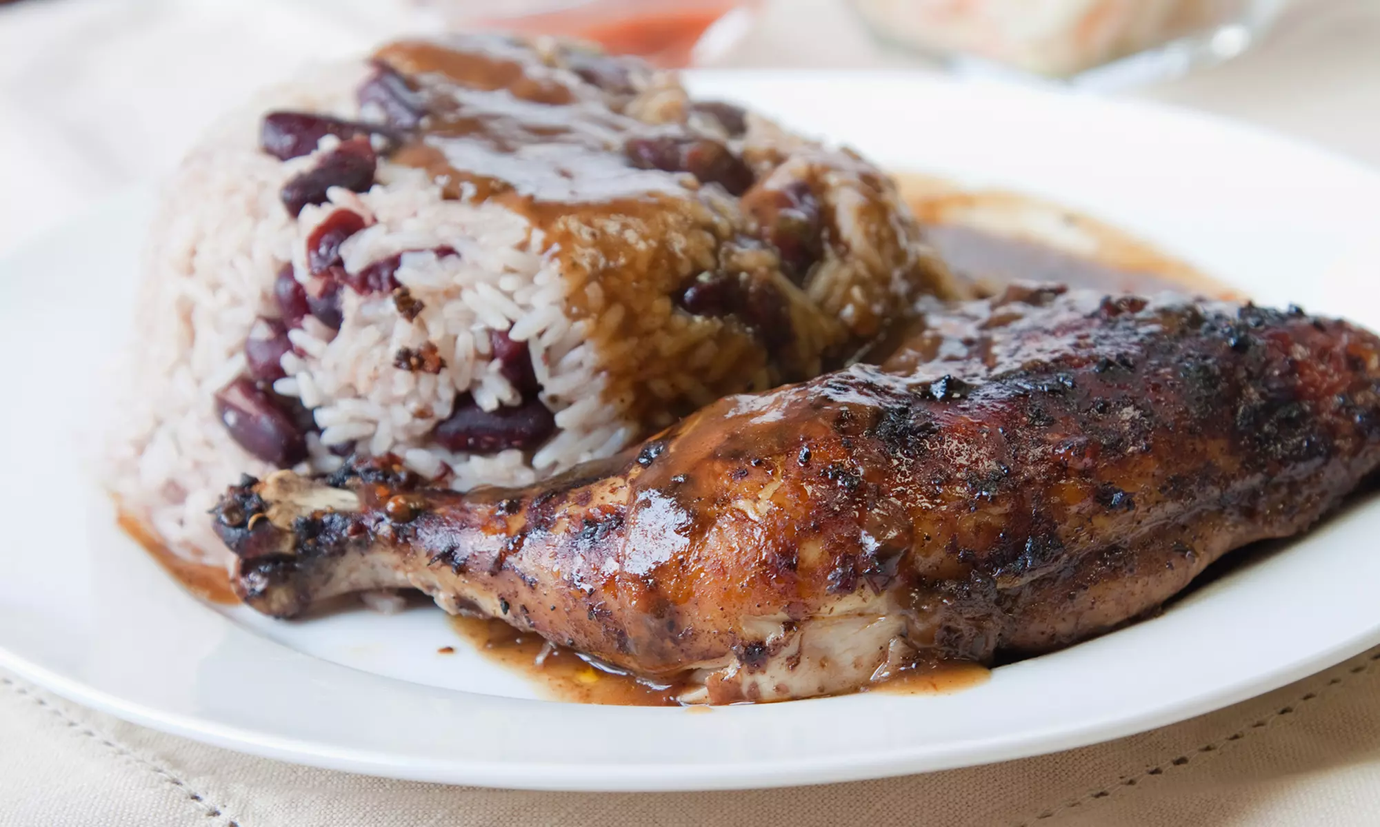 Jamaican Fare at The Jerk Pit in College Park (40% Off). Two Options Available.  - Primary Image