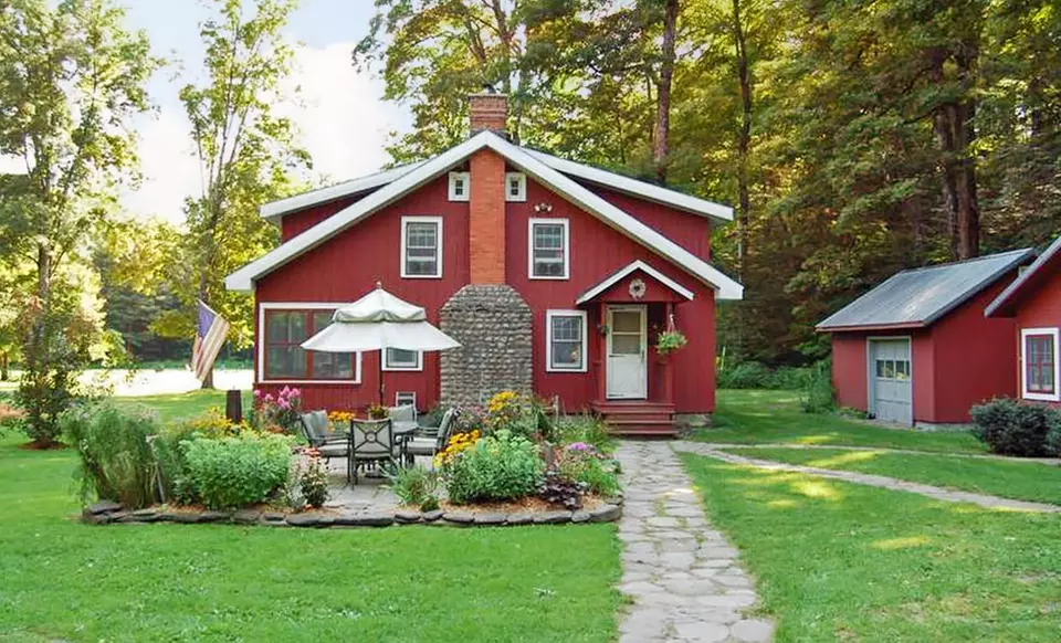 1- or 2-Night Cabin Stay for Two with Wine at Wellnesste Lodge in Taberg, NY. Combine Up to 10 Nights. - Primary Image