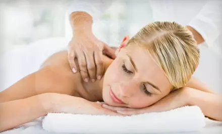 $90 for a One-Hour Hot-Stone Couples Massage ($190 Value) or $70 for a One-Hour Four-Handed Massage ($140 Value) at Light Hands Therapeutic Massage East - Primary Image