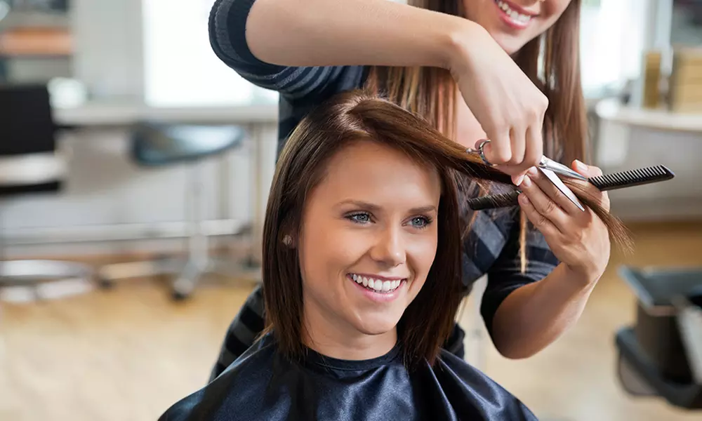 $82.50 for Blow-Dry and Moroccanoil Conditioning with Partial Highlights at Isaac B. Salon ($205 Value) - Primary Image