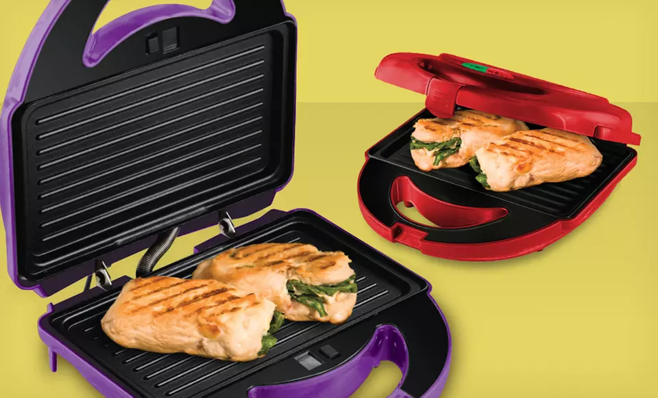 $39.99 for a Big Boss 7-Piece Grill in Purple or Red with Removable Cooking Plates ($59.99 List Price). Free Shipping. - Primary Image