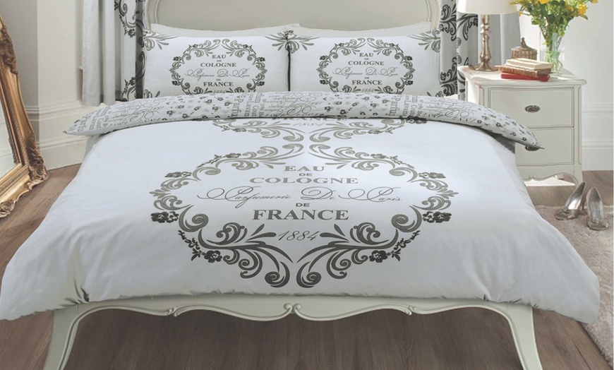 Image 1: Paris Script Reversible Duvet Set