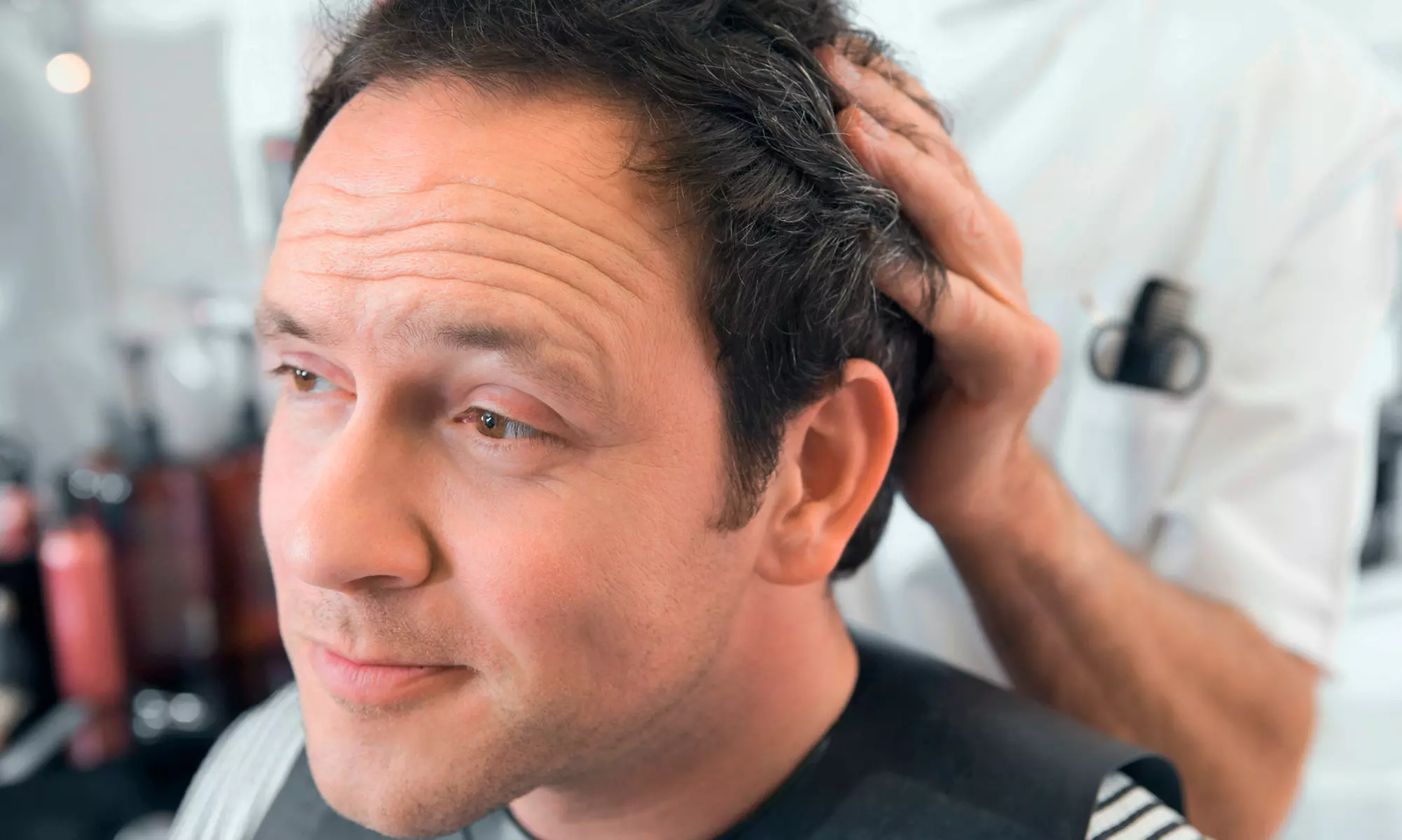 Michael's Barber Shop offers men's haircuts with extras, including shaves and massages, with discounts up to 56% - Primary Image