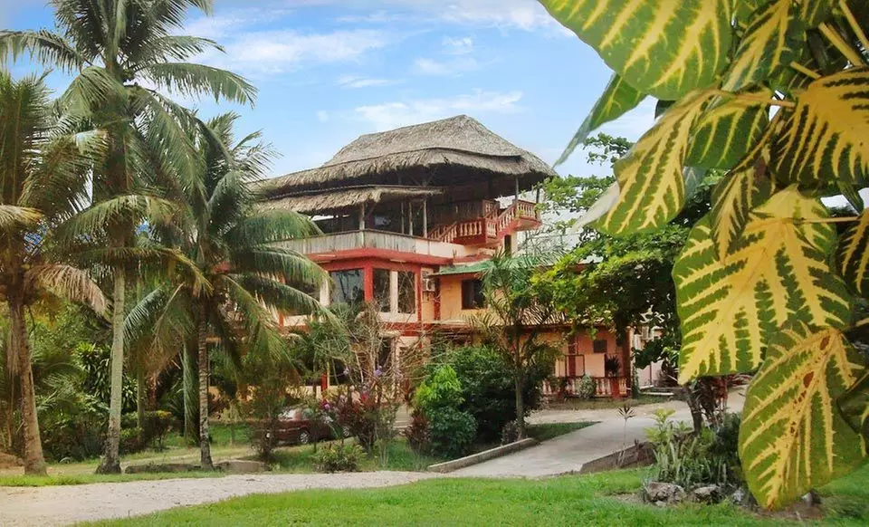 Three-, Four-, or Five-Night Stay with Airport Transfer and Option for Tour Credit at Macaroni Hill View Hotel in Belize - Primary Image