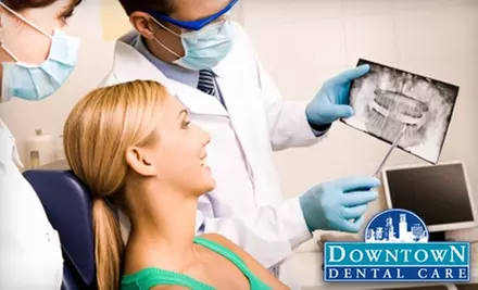 $79 for Dental Exam, Panoramic X-rays, and Teeth Cleaning ($434 Value) or $189 for a Zoom! Whitening Treatment ($675 Value) at Downtown Dental Care - Primary Image