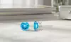 Paris Jewelry White Gold Plated Created 2Ct Round Swiss Blue Topaz Stud Earrings