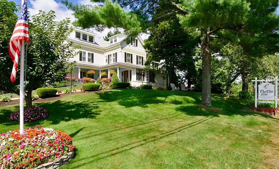 Stay with a Bottle of Wine at Puffin Inn in Ogunquit, ME. Dates Available into June. - Primary Image