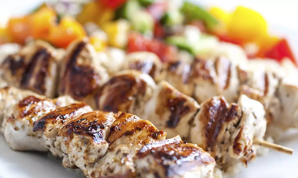 Greek Dinner with Wine for Two or Four at Santorini Restaurant (Up to 41% Off) - Primary Image