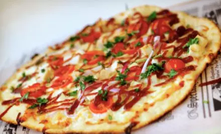 Two or Four Pizzas with Drinks on Sunday–Thursday or Friday–Saturday at The Pizza Press (Up to 56% Off) - Primary Image