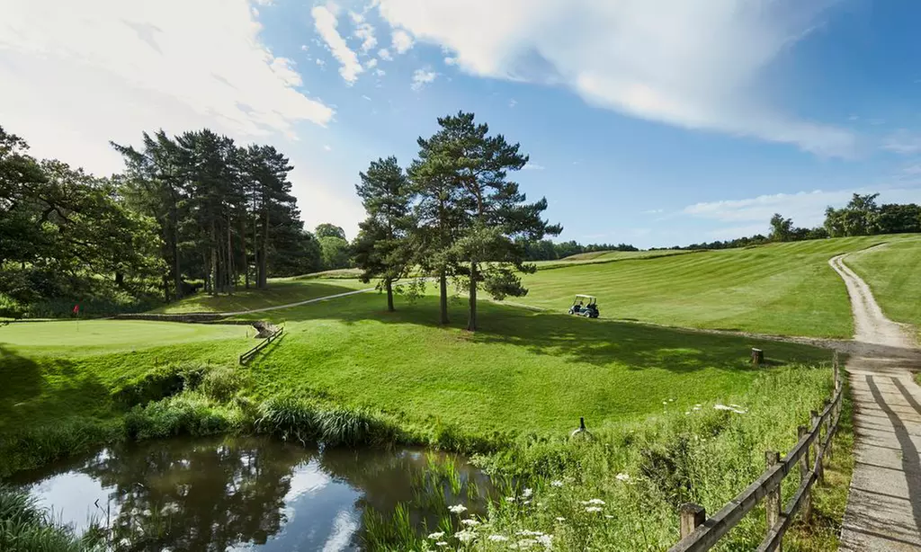 18 Holes of Golf with Bacon Roll and Hot Drink at Shrigley Hall Hotel!