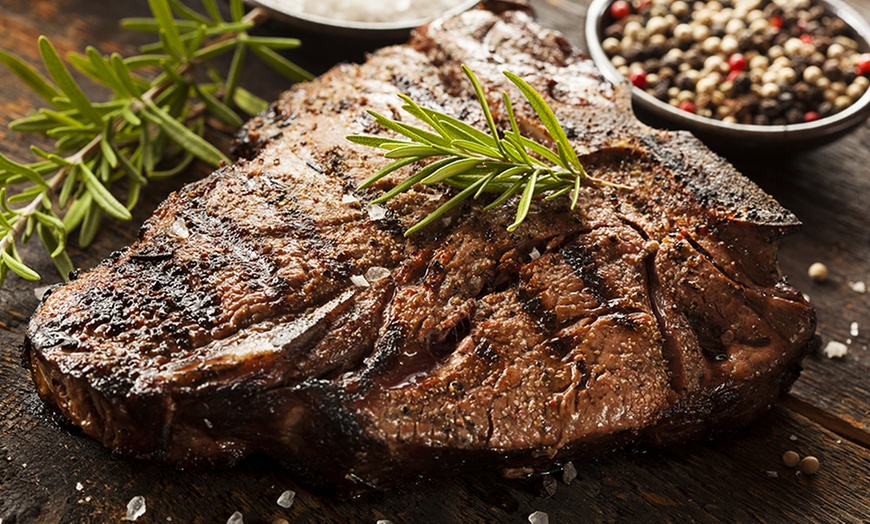 Image 1: Steak Meal with Bottle of Wine