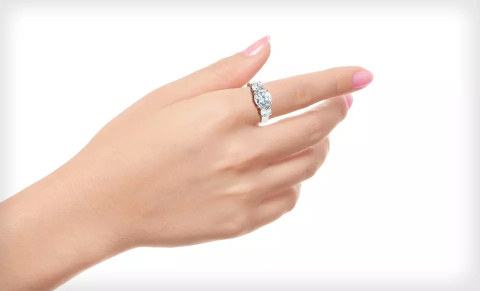 $8.99 for Cubic Zirconia and Rhodium-Plated Brass Engagement or Wedding Ring Sets ($52.99 List Price). Free Returns. - Second Medium