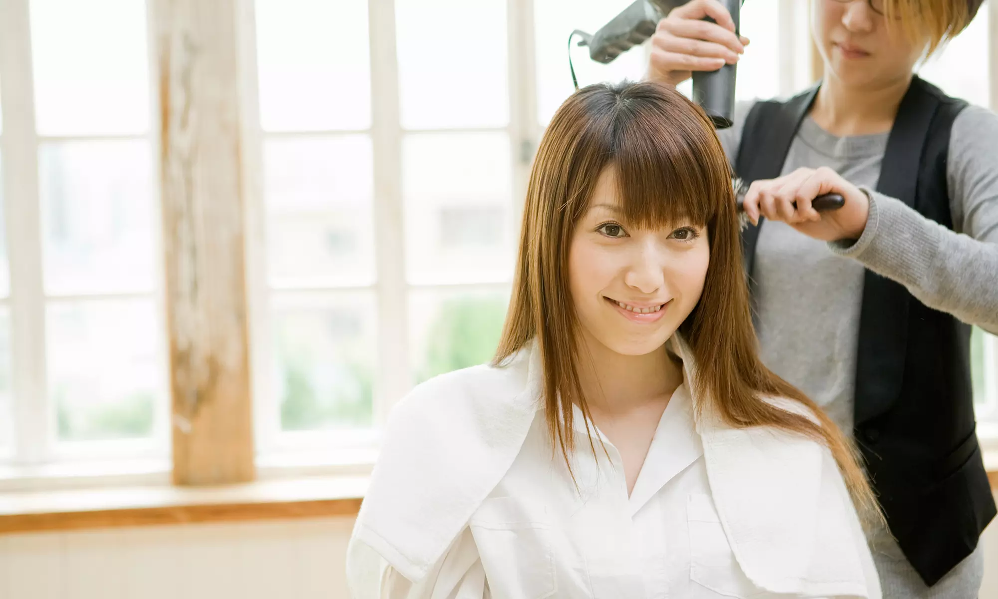 Haircut with Coloring Procedures or Brazilian Blowout with Sandy at Shear Wonder Salon (Up to 50% Off) - Primary Image
