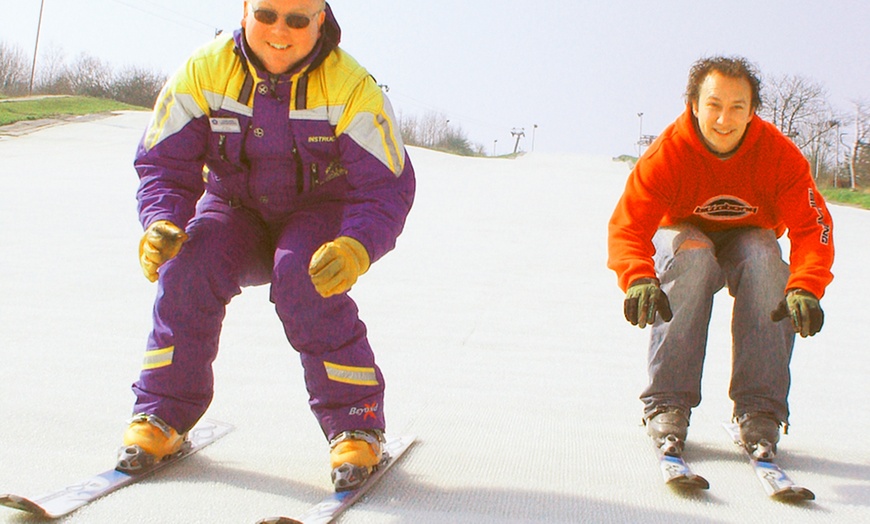 Image 3: Skiing or Snowboarding Lesson