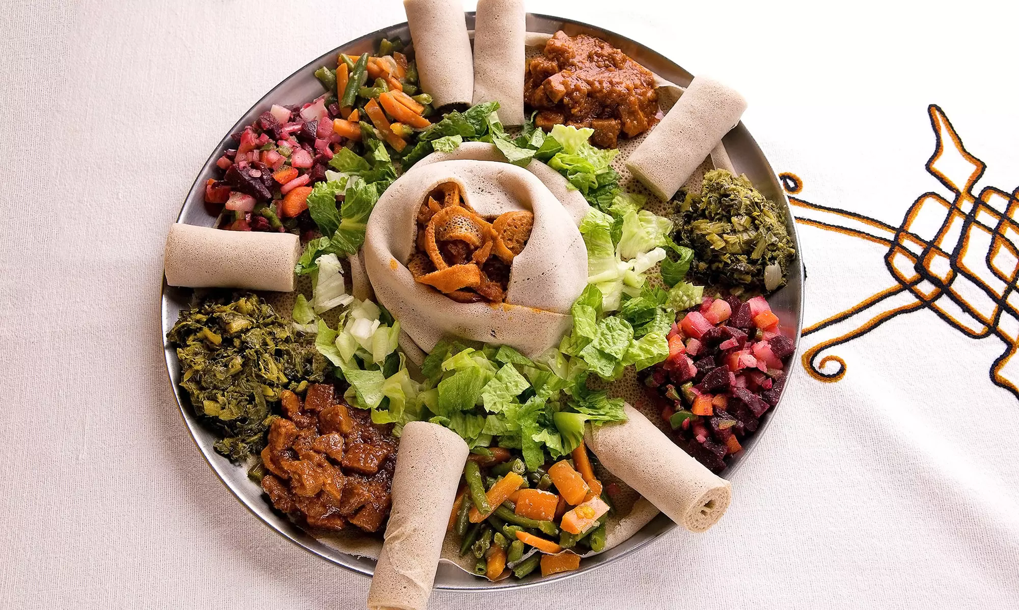 Ethiopian Food for 2 or 4, Valid Monday–Thursday or Any Day at Lalibela Ethiopian Restaurant (Up to 56% Off) - Primary Image