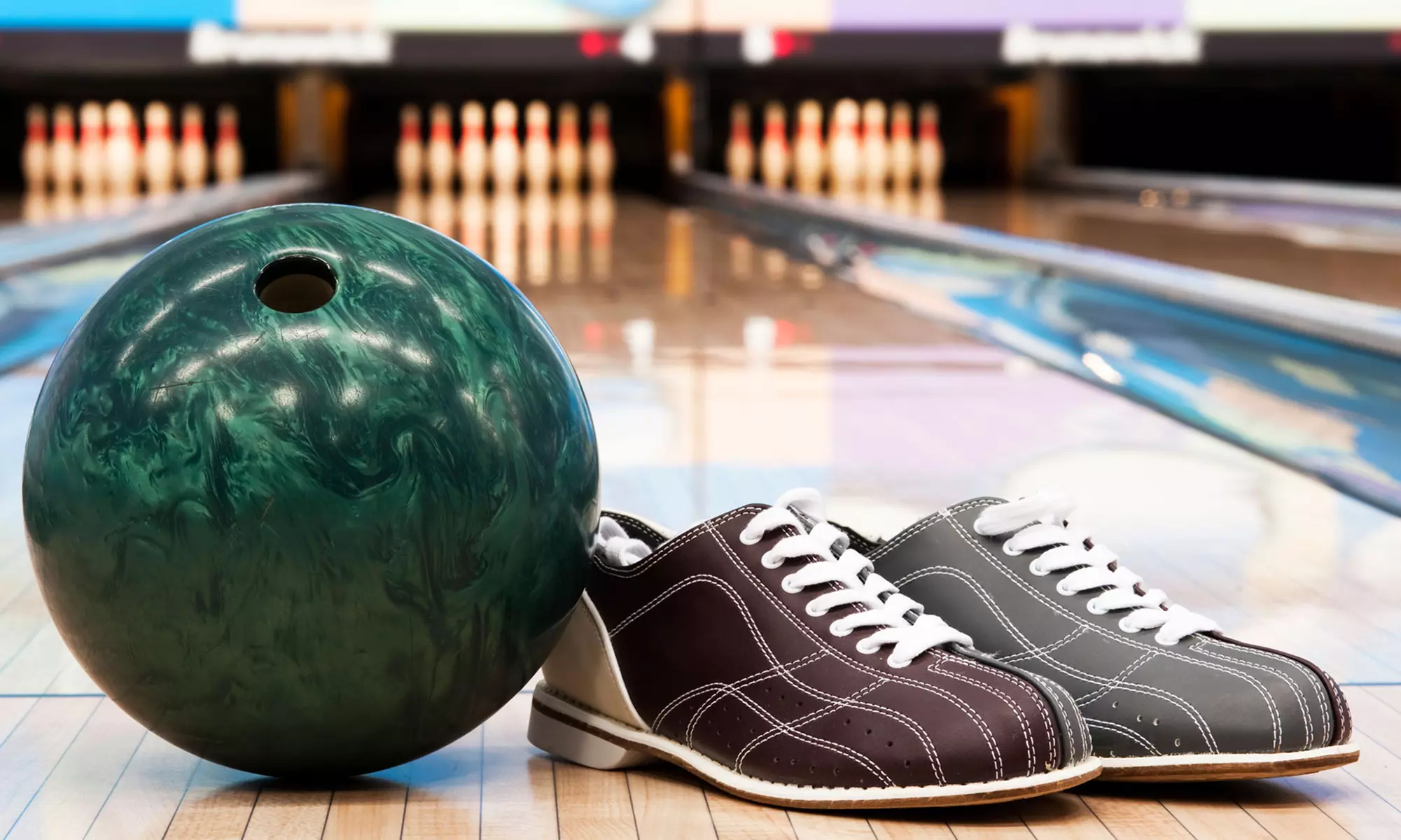 Two Games of Bowling for Two, Four, or Six with Shoes, App﻿s, and Drinks at Slocum's Bowling Center (64% Off) - Primary Image