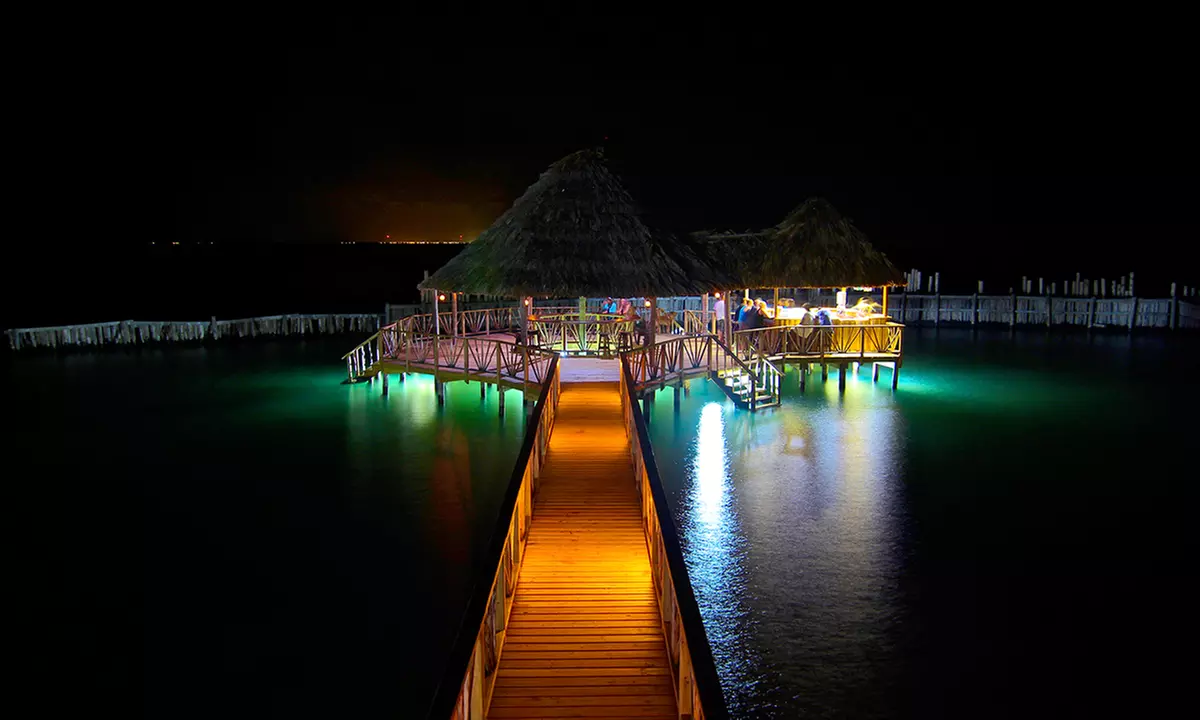 3- or 5-Night Stay for Two with Optional All-Inclusive Package at Thatch Caye Resort in Belize. Airfare not included. - Primary Image