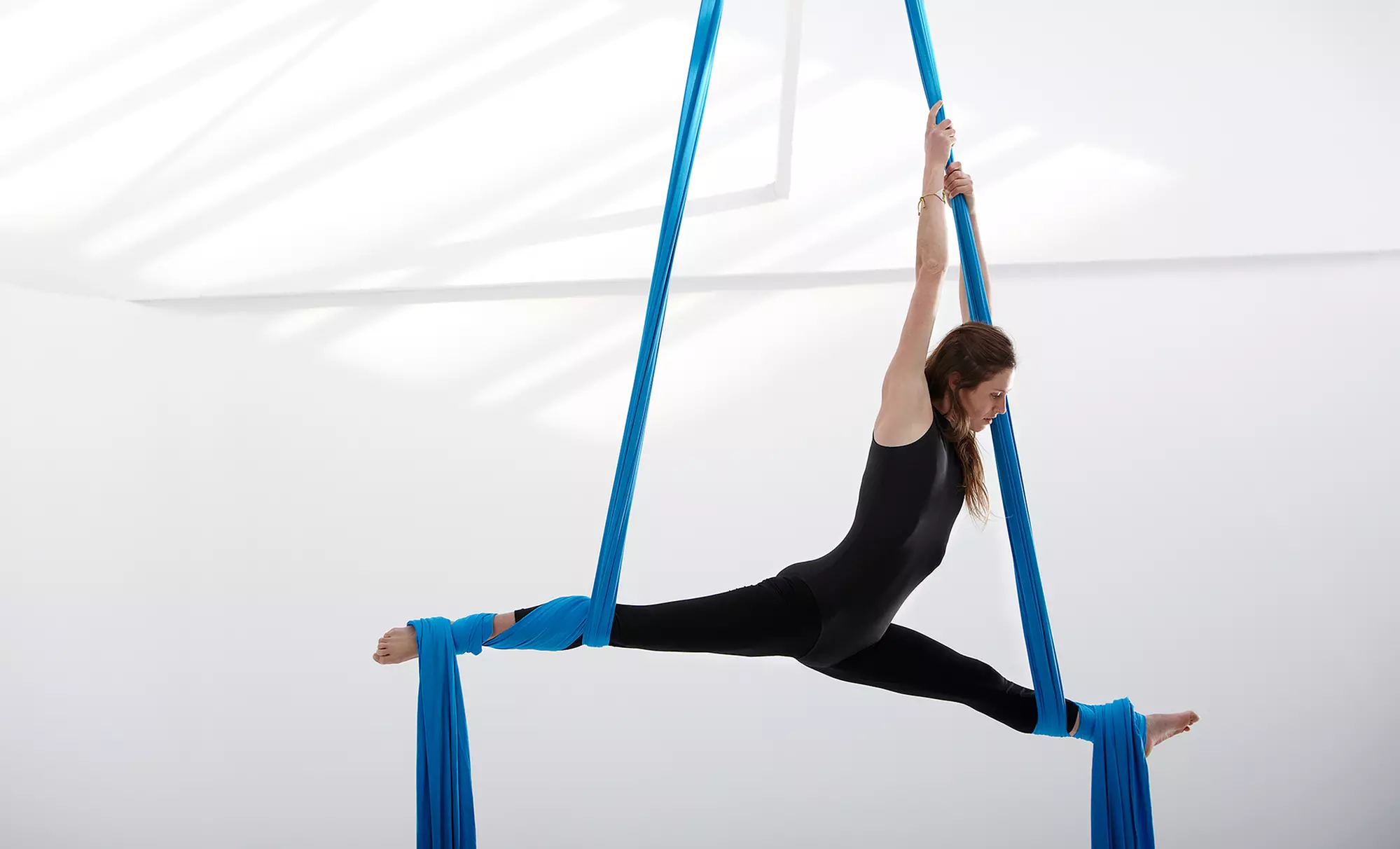 5 or 10 Yoga, Aerial Yoga, and Pilates Classes at Cardio-Go (Up to 72% Off) - Primary Image