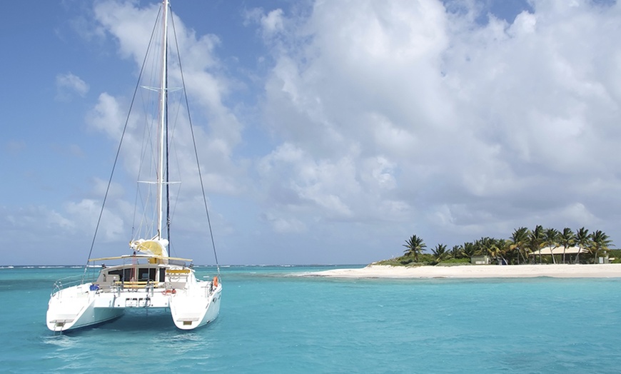 Image 1: 4-Hour Catamaran Cruise with Lunch, Beach Games, Fishing, and More