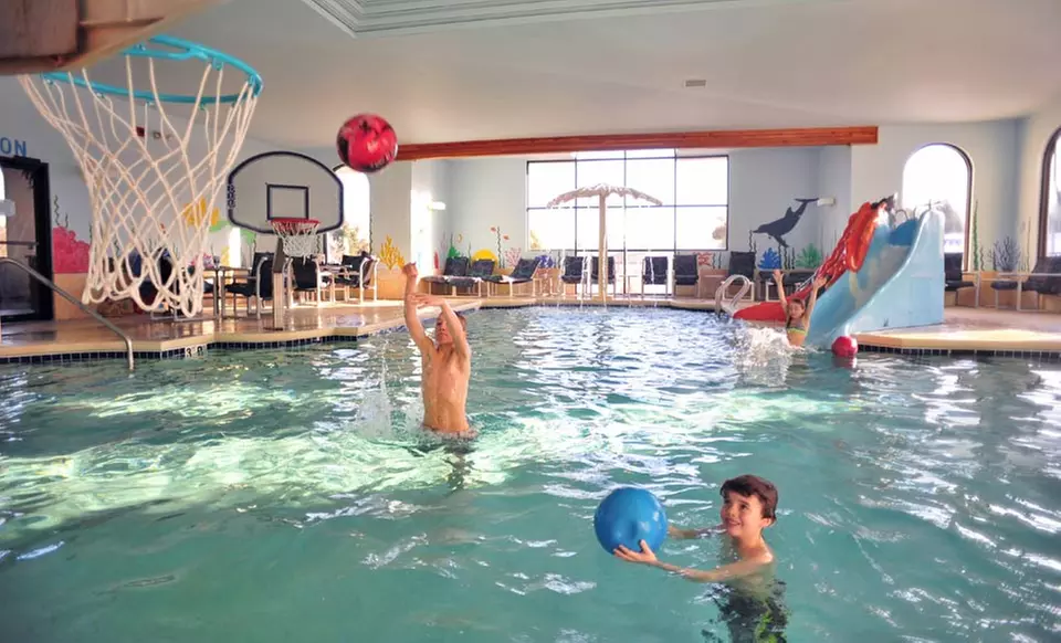 Stay with Water Park Passes & Breakfast at Atlantis Waterpark Hotel in Wisconsin Dells. Dates Available into August. - Second Medium